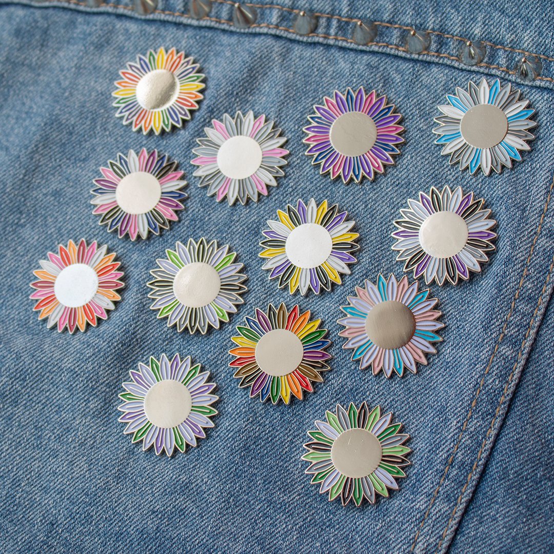 StudioChuffed's tweet photo. New pins ✨

The lesbian flag is finally restocked, but with a redesign, so it's now in the colours of the new flag 🧡

I've also added 4 flags to the range - genderfluid, demiboy, demigirl, and the Philadelphia / inclusive version of the rainbow flag! 🌈

https://t.co/J61uIZmAfy https://t.co/imUUlaZN0z