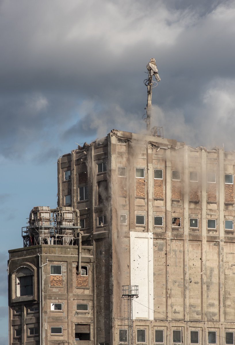 AlbieClark's tweet photo. Imperial Dock Grain Elevator, Leith. Sad to see the corner finally come down, and a fair old spot of luck with a sprint to capture it/30 frames left on the card. #leithdocks https://t.co/aVyqT06436