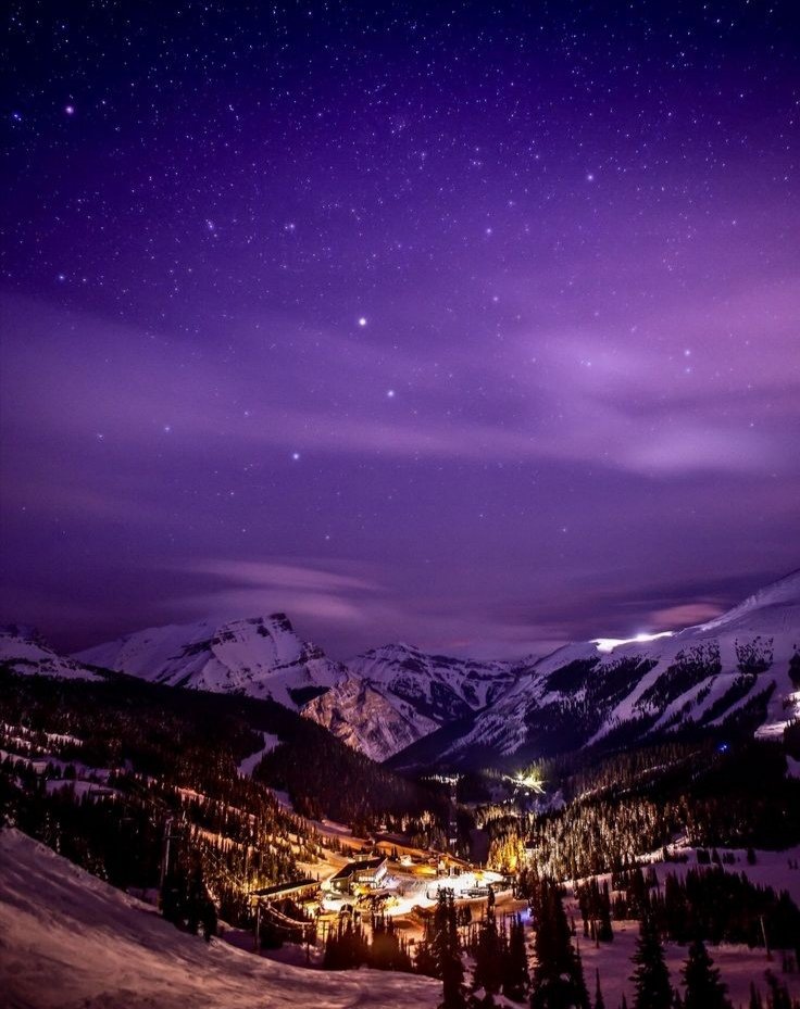 Banff National Park at night with a magical view . Canada 🇨🇦❤️💜🧡