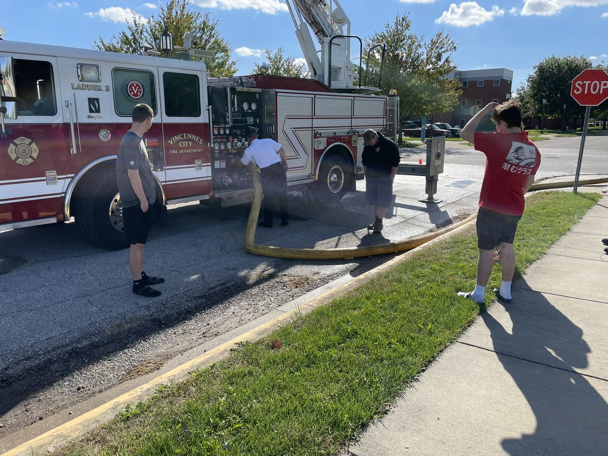 FireVincennes's tweet photo. Great day yesterday with guests.  First Captain Wheeler of the Indianapolis Fire Dept spoke to our students about how to start a career in the fire service.  Later Vincennes City FD Ladder 3 and Battalion Chief Beaman set up a pumping demo. Thanks to everyone. https://t.co/Xa681QwnR3