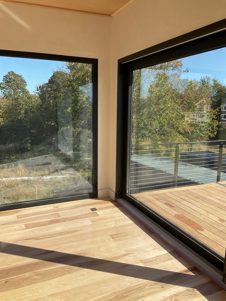NPTRE's tweet photo. Outside and inside look at the beautiful deck installed at our #Sachuestbuild.
The deck features Garapa wood from Liberty Cedar and a railing system from Viewrail. Inside features Hurst hardwood flooring and Schuco windows.
#constructionlife #garapawood #zeroenergyhome https://t.co/GknG8r5msh