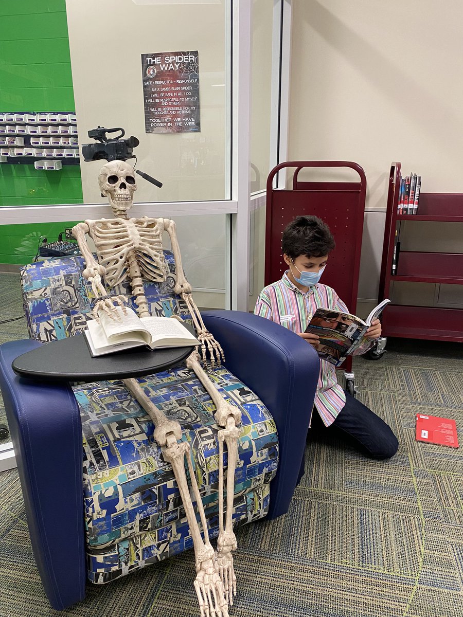 Quality reading time with Frank the Skeleton 💀📖 #spiderlibrary💜