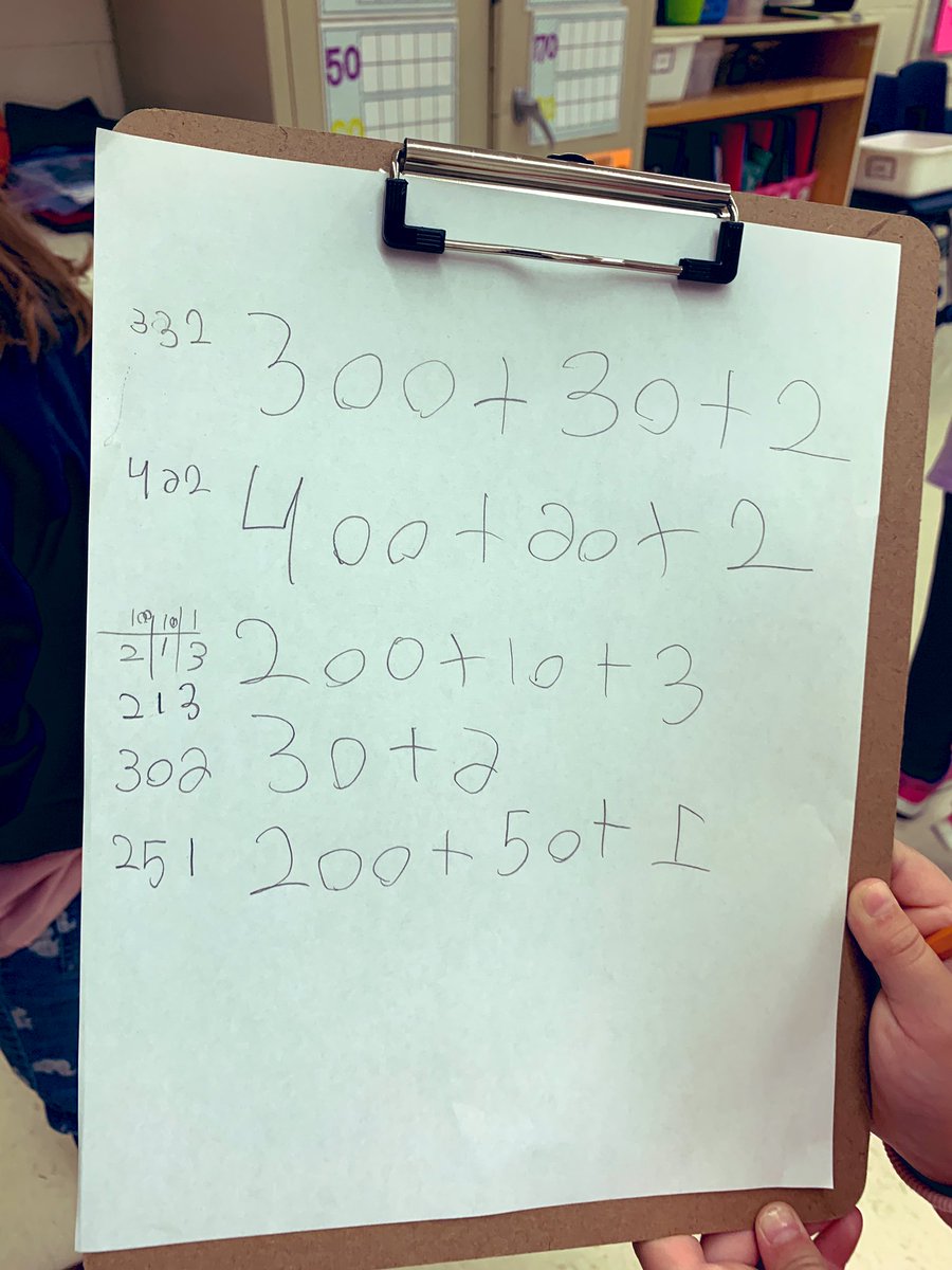 MrsGoncalves20's tweet photo. We have been busy exploring place value in Grade 2. My students have been moving around the room to explore different base ten values. #representingnumbersindifferentways #standardform #expandedform @JPRobartsRams https://t.co/9nsT3aQNAU