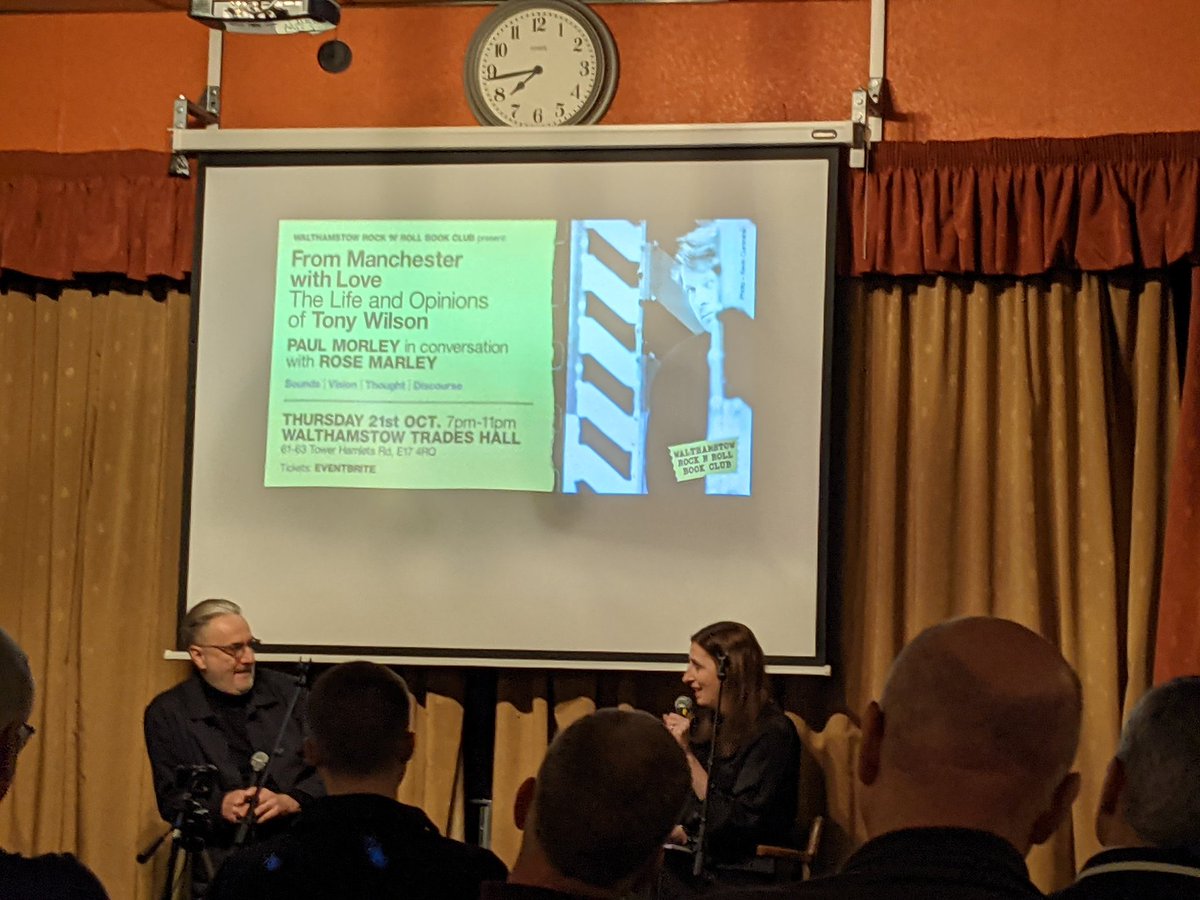KeithMansfield's tweet photo. Top evening last night for the launch of Paul Morley's #FromManchesterWithLove, a biography of Tony Wilson. All at Walthamstow's @e17RnR_books, Morley deep in conversation with @RoseMarley1 in @stowtradeshall. Wilson was an amazing guy and I suspect only Paul could do him justice https://t.co/ku2Z7QsrLd