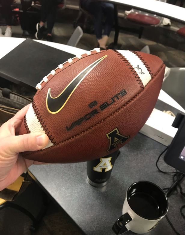 BrianKHasson's tweet photo. Cool story. In a scrum, a student of mine captured the football from the game winning FG, connected with Chandler Staton, and worked out a mutually favorable exchange. He even brought it to class the morning after, so we could touch history. 200,000 extra credit points. https://t.co/WOpHk443fn