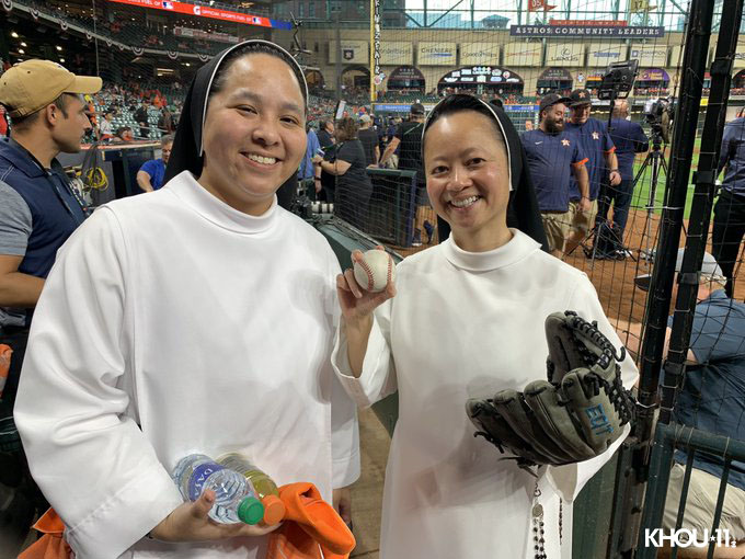 KHOU's tweet image. The "Rally Nuns" have made their way to Minute Maid! They will be cheering on the 'Stros tonight from the Coca-Cola suite but not before Sister Mary Catherine throws out the first pitch. @astros 

LET'S GO ASTROS!!! ⚾💙🧡  #astros #alcs #ForTheH