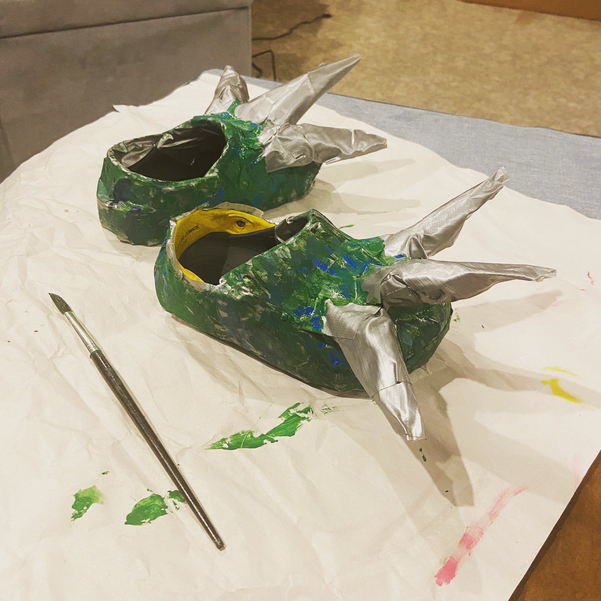 WanderWhimsyFam's tweet photo. When your 5 year old suddenly realizes that he "NEEDS feet with claws for his Halloween dragon costume!" Thank goodness for duct tape and acrylic paint. 🤷🏻‍♀️#goodenough https://t.co/8aUIAe4DzY