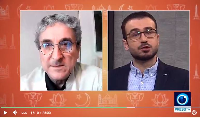 Karel Vereycken (left) interview with Press-TV