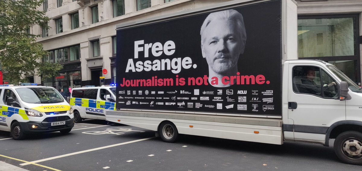JulianAssange's tweet photo. Images from todays huge March for Assange in London, highlighting the ongoing political persecution of the publisher ahead of next weeks 27-28 October court hearing #FreeAssangeNOW https://t.co/QZpt7Smtcr