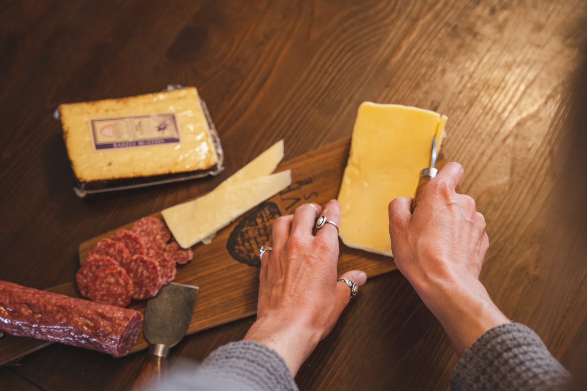 beehivecheese's tweet photo. Tim had some coffee beans roasted by his brother in Colorado lying around. In a moment of curiosity, Tim &amp; Pat grounded those beans and rubbed it on the rind of the cheese, set it aside, and promptly forgot about it… 
.
#BarelyBuzzed #MakingFriendsWithCheese #Cheese #Cheddar https://t.co/c3Ez5ZAcAy