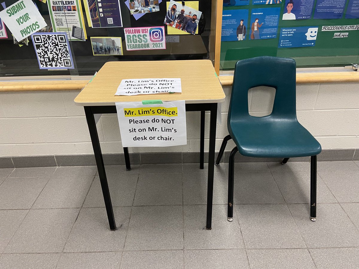 My office in first floor hallway — spend most of day chatting with students and staff — all I need is a student desk and chair. Happy students are learning to respect property as they no longer sit on the Vice-principal chair or desk!