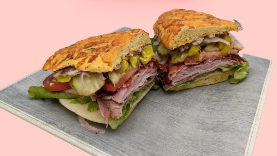 Our specialty sandwich “The Eli” is piled high with Boar’s Head sliced turkey, roast beef, ham, bacon, tomatoes, pickles, pepperoncinis, red onions, and provolone cheese and made fresh to order when you visit the full-service deli. Stop by and pick one up for a great lunch today!