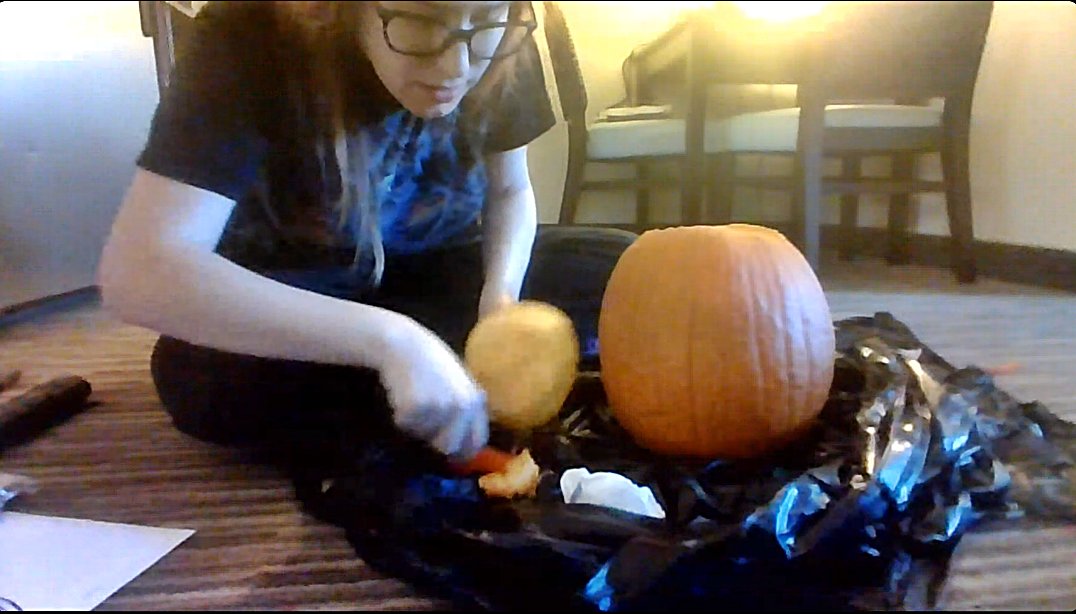 verracaravan's tweet photo. LieutenantToast, @AshesofCreation Senior Community Manager during a Discord Livestream. Sarah was kind enough to share her pumpkin carving skills. Do you carve your pumpkin from the top or bottom? #AshesofCreation #IntrepidLife https://t.co/lTPvgkxt5e https://t.co/XwbWCiC1LQ