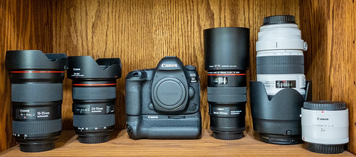 Need some advice. Visiting #Seattle for 9 days and trying to decide what to pack for #camera gear. Currently using #canon 5D and L lenses (see pic).  Also have flashes, tripod, etc.  Want to take it all but carrying all that around seems senseless. Advice? How to pare it down?