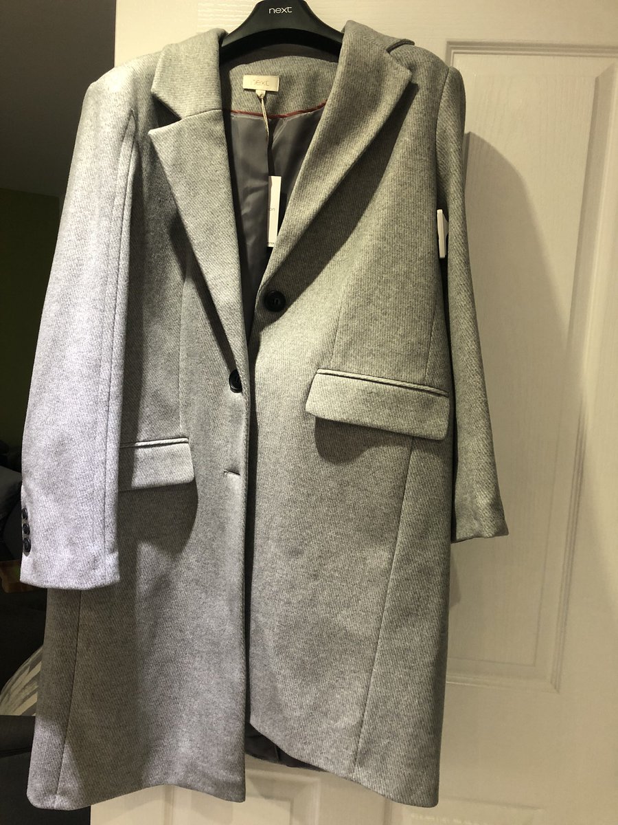 sharongeddes's tweet photo. @nextofficial wow! Just received my order and this is how it came! No inner bag, buttoned up wrong and a security tag still attached. 😠really not amused or happy https://t.co/nrtCrdc18F