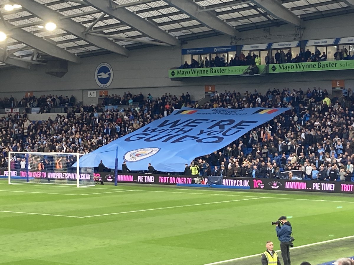 StuartBrennan63's tweet photo. City fans have a message for the injured fan. #mcfc https://t.co/cd4SmgibnK