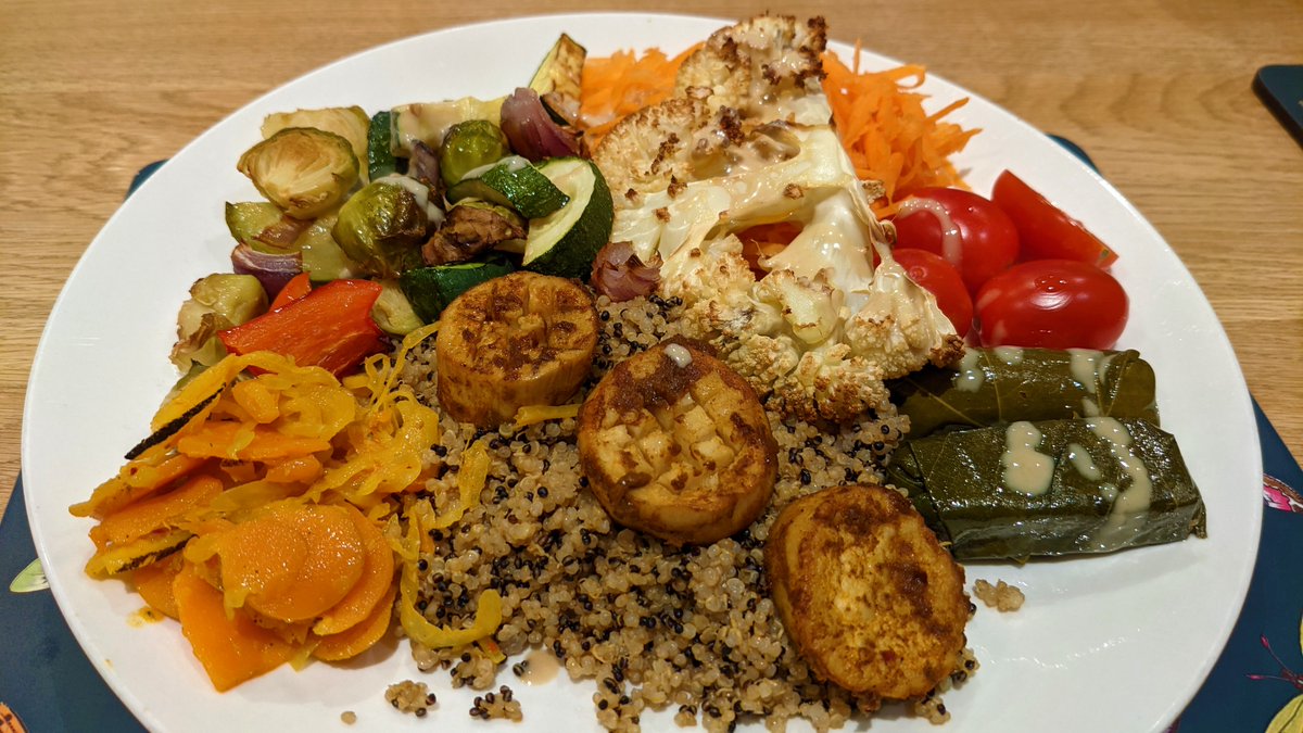 A big 🌈plate for tea &amp; some of my favourite products (see tags) roast cauli &amp; veggies, kimchi, tahini, quinoa, mushroom scallops, carrot, tomatoes, vine leaves...I got 16 of my 5 a day today already &amp; not finished yet😂#Itseasy2bvegan #Veganfoodshare #Veganfriendly 😋🌻🌱
