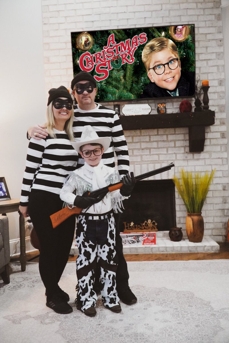 coreyfrizzell's tweet photo. “Ralphie saves the day!” Mr. Ryman as Ralph and mama and daddy as Black Bart and the gang. 

#christmasstory #ralphie #halloween #blackbart #nashville #cosplay #countrymusic #redryder #ryman #frizzell #mrryman https://t.co/GPFKx3Fdkf