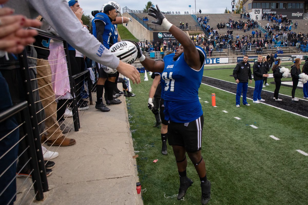 gvsufootball's tweet photo. Nothing like ending the day by celebrating a win with the best fans in the country 🖤 https://t.co/5SFsk9Trzg