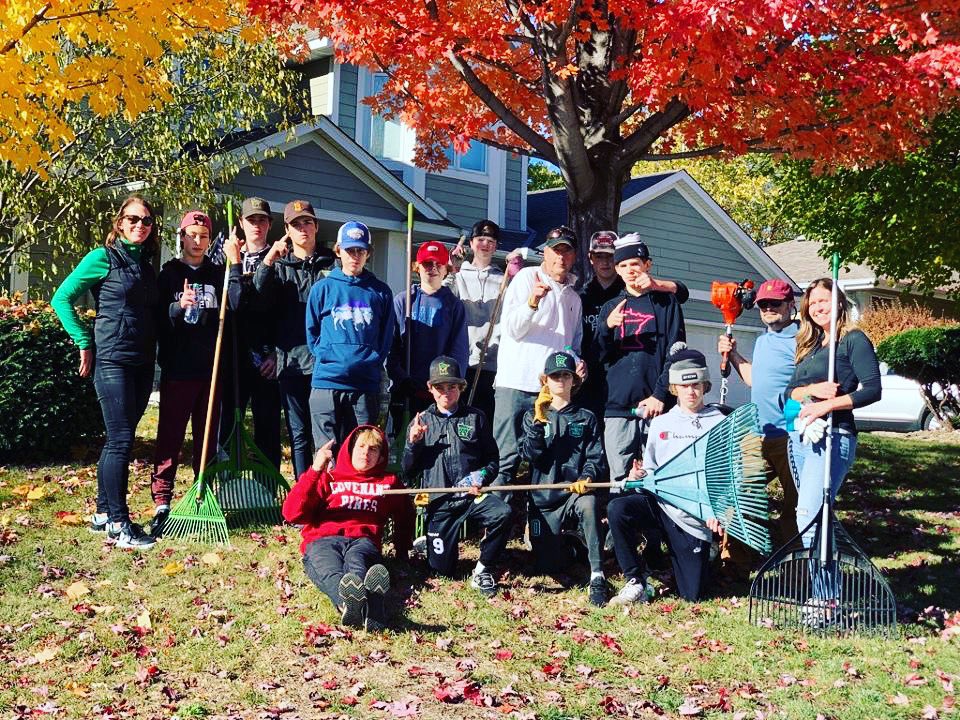 BB1White's tweet photo. The boys spent time away from the rink giving back to the community by raking yards for seniors on a beautiful fall day.  #rakeadifference https://t.co/6LdP3XB5VH