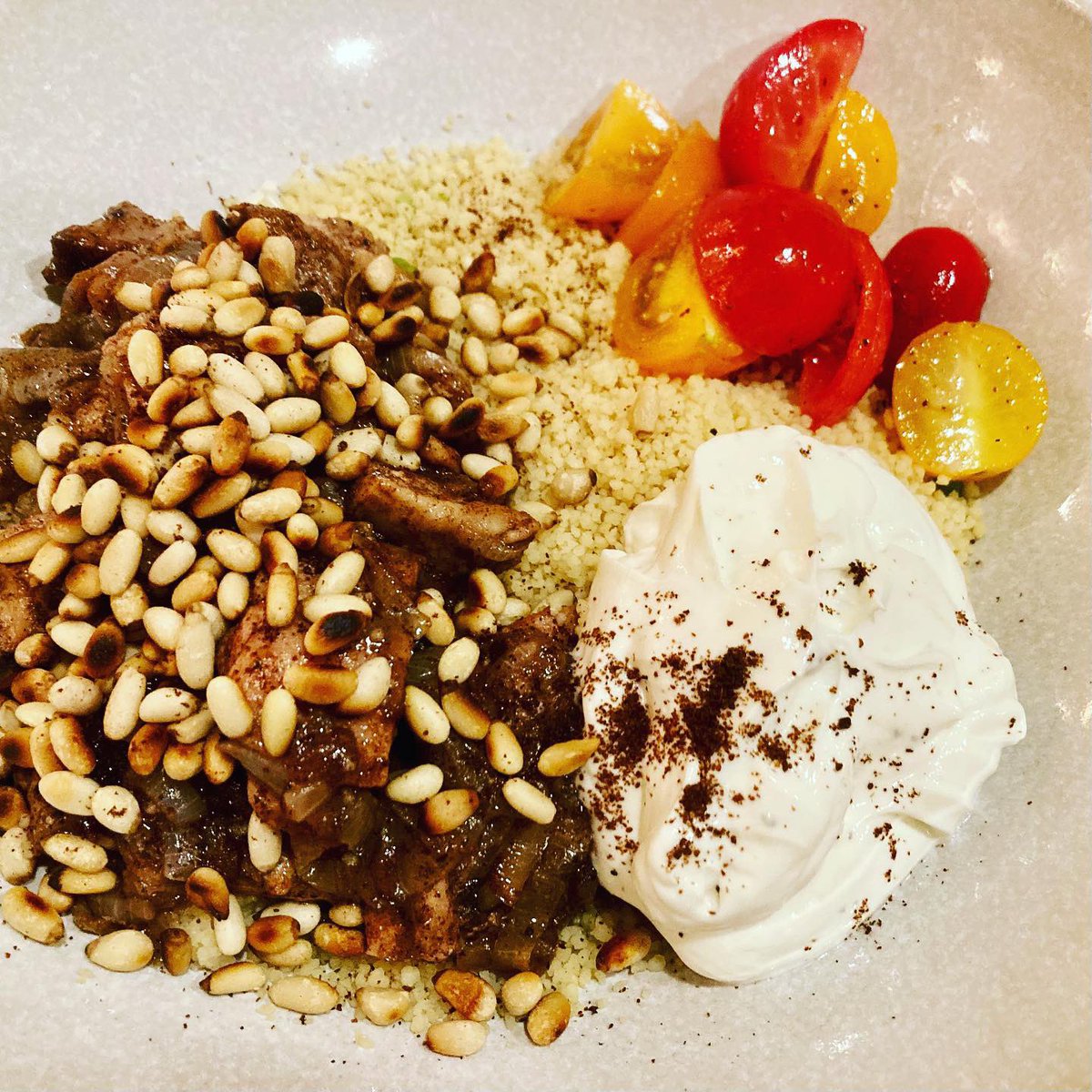 DorsetRachel's tweet photo. I’ve had The Cold so being able to cook (&amp; taste!) #tonightsmenu is my #GoodNewsSaturday: chicken thighs diced &amp; fried w onions, cinnamon, cardamom &amp; allspice, served w pine nuts, sumac &amp; yoghurt.  Warm North African flavours for a chilly North European evening. #claudiarodenmed https://t.co/uDQ1zelpXp