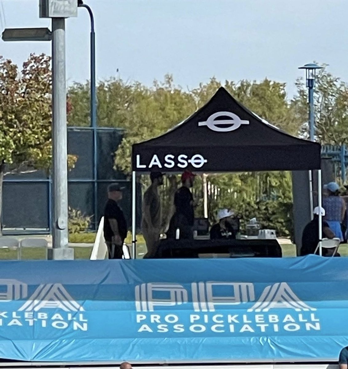 SharpAgentKC's tweet image. At PPA tournament in Vegas. During match play Lasso vender are heckling during points.  Player asks them to stop twice.  After third time player is aggressive to vendor. Employee then get tournament director and player is forced to forfeit.  I returned my free socks @lassogear