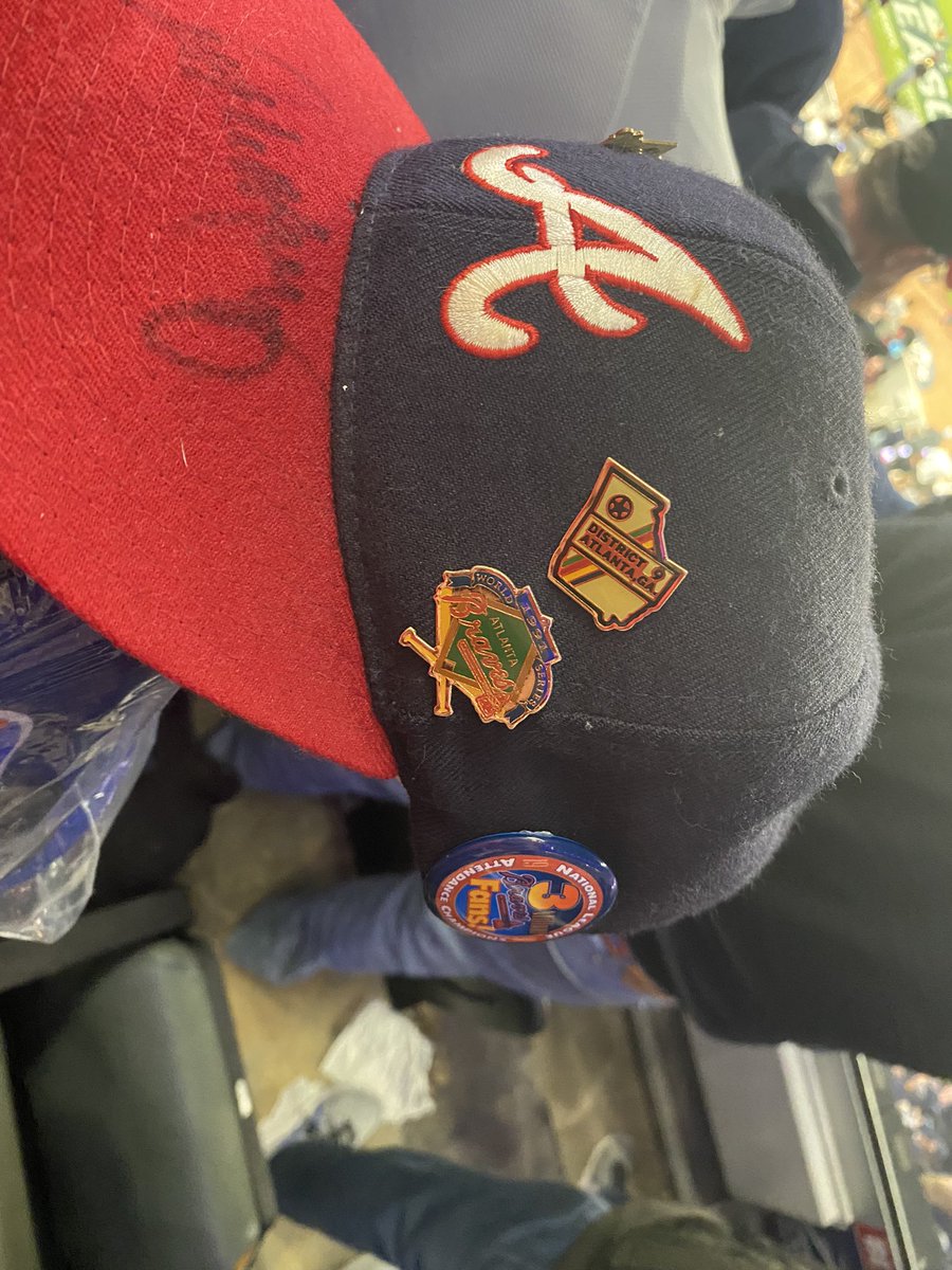 AmpFloyd's tweet photo. Guys…..I’m wearing my 1991 hat signed by Dale Murphy. With my son who was my age in 1991. Im actually a little emotional. @Braves #BattleATL #NLCS #NLCSgame6 https://t.co/S2J40se0A7