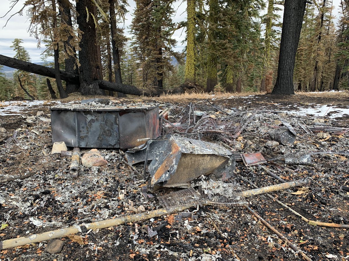 safeeqkhan's tweet photo. We were out in the #caldorefire burn area earlier this week scouring for a potential research site. Old precip gauge and areal snow marker are still standing the historic @CA_DWR Alpha test site but it was quite saddening to see the cabin only few feet away completely destroyed https://t.co/pUwH5G06Fk
