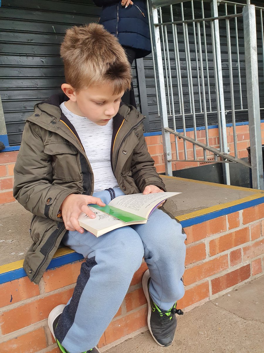 clairedunlop77's tweet photo. Alfie is loving reading George's Marvellous Medicine. Here he is engrossed in his book whilst his brother is at rugby 😍 #readingforpleasure https://t.co/ioaU4eeMx4
