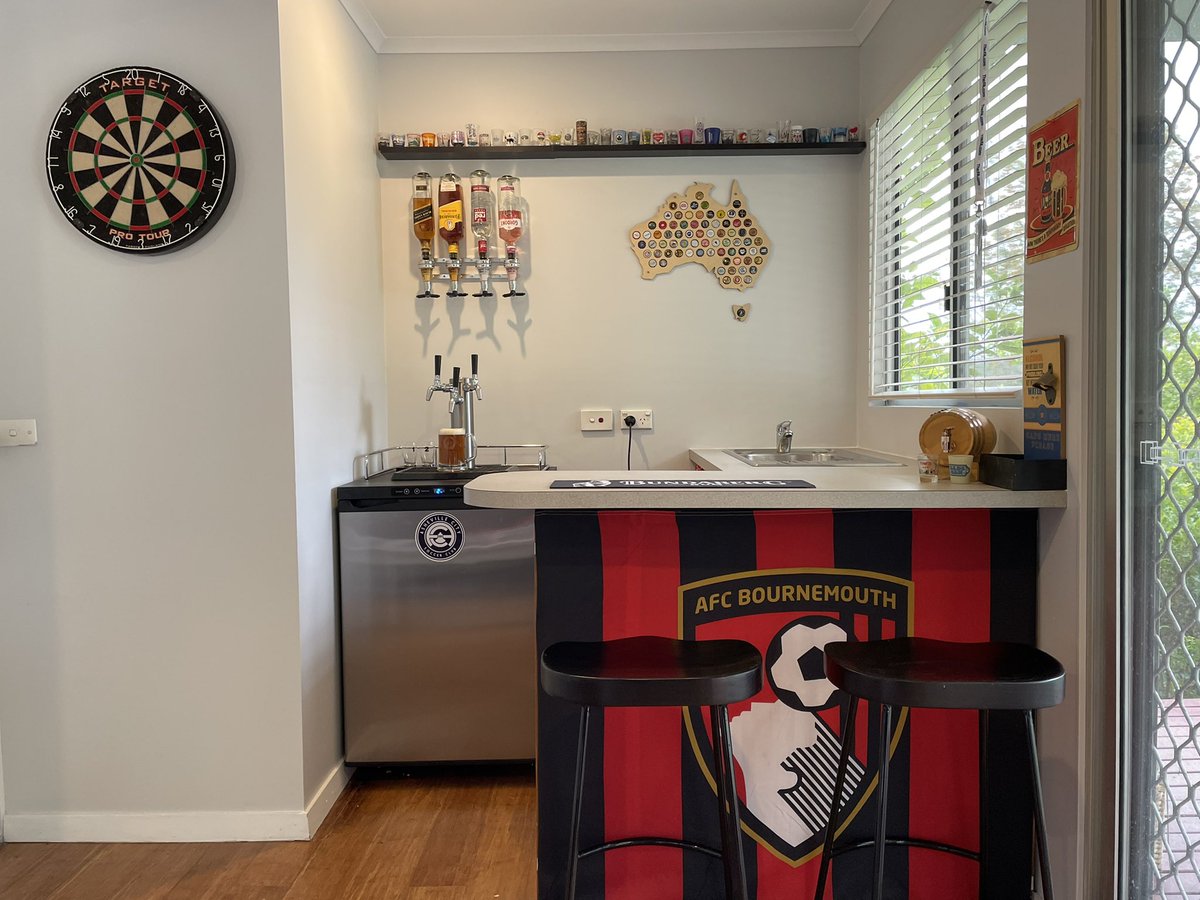 gibbertim's tweet photo. Finished my home bar today in Australia. Looks like it could be the new home for @AFCBCtrlCoast. A signed shirt on the wall would look pretty good… @afcbournemouth ❤️🖤❤️ https://t.co/OZNbsTobo4