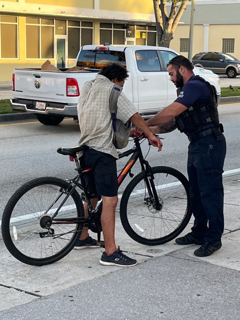 WestPalmPD's tweet photo. Our bike light program is back! Traffic officers are providing and installing bike lights and educating bicyclists on rider safety. #wpbpd The City of West Palm Beach #bikesafety https://t.co/tB2hRs7v5k