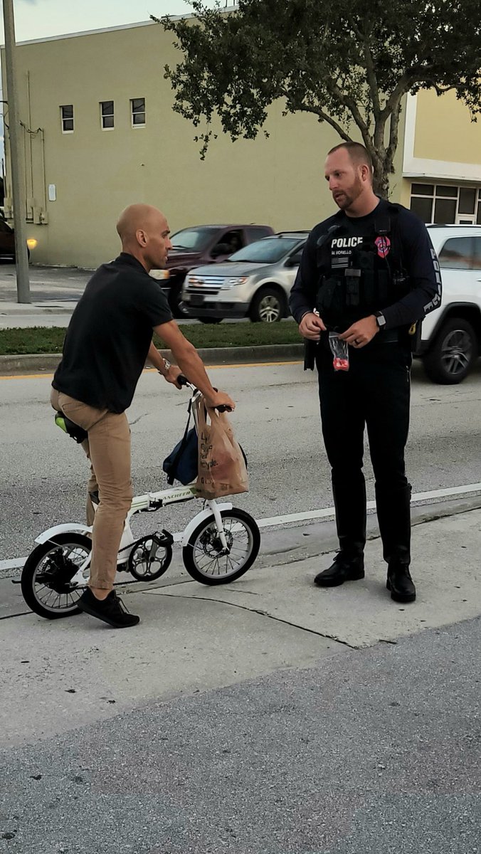 WestPalmPD's tweet photo. Our bike light program is back! Traffic officers are providing and installing bike lights and educating bicyclists on rider safety. #wpbpd The City of West Palm Beach #bikesafety https://t.co/tB2hRs7v5k