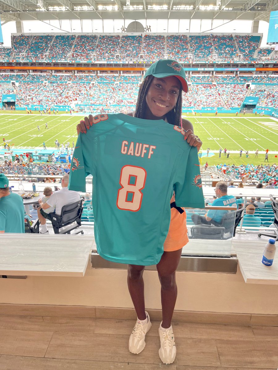 MiamiOpen's tweet photo. Welcome back to @HardRockStadium, @CocoGauff! 🤩 

Happy to have you here for today’s @MiamiDolphins game! 🏈 #FinsUp https://t.co/YqWdHVr1Kd