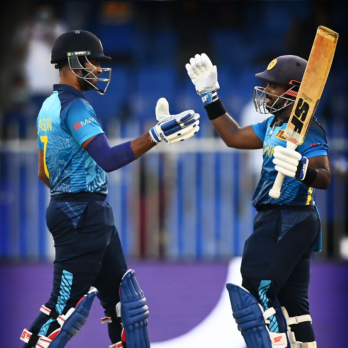 ICC's tweet photo. It was a big day for celebrations today as Sri Lanka and Pakistan take the wins on Day 2 of the Super 12s!

@RoyalStaglil | #InItToWinIt https://t.co/T6tWSMXroX
