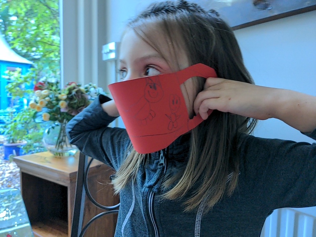 Sister-in-law asked my 5 year-old if she'd make her a Halloween mask. 5 year-old was super excited by the idea and made this. Ah, the joys of growing up in a pandemic.