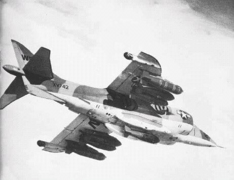 HarrierPres's tweet photo. Wearing the markings of VMA-513, here we get a shot of AV-8A XV742, carrying a rather large array of external weapons! Including BL755s, 1000ibs bombs and Aden cannons. 742 would eventually be delivered to the USMC. Circa 1973. #HarrierGR1 #AV8A #VMA513 #Hawkersiddeley https://t.co/LrpTAcvsHt