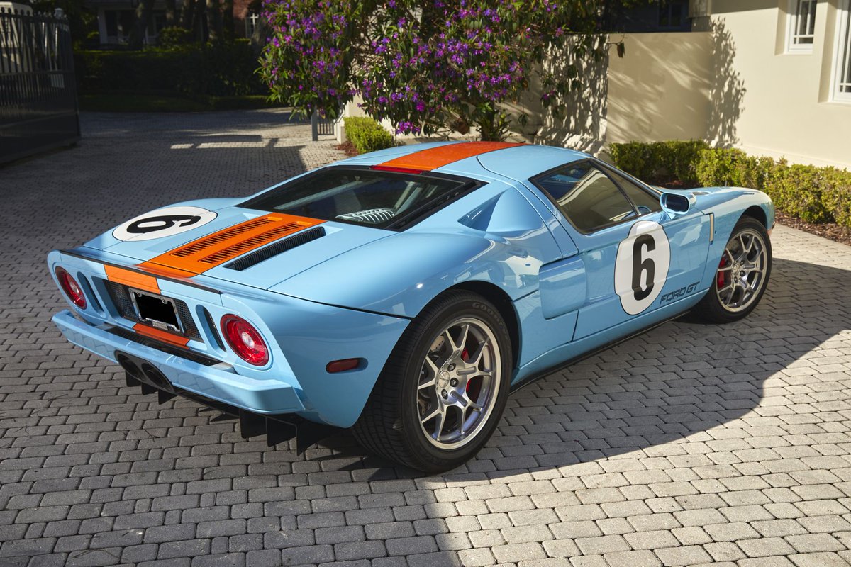 #AuctionUpdate This 2006 Ford GT Heritage reaches $588,700. For the 2006 model year, Ford took the GT a step further by introducing this special Heritage Paint Livery Package edition. Here, an excellent example of the blue and orange Gulf Oil livery. #SothebysxMGM
