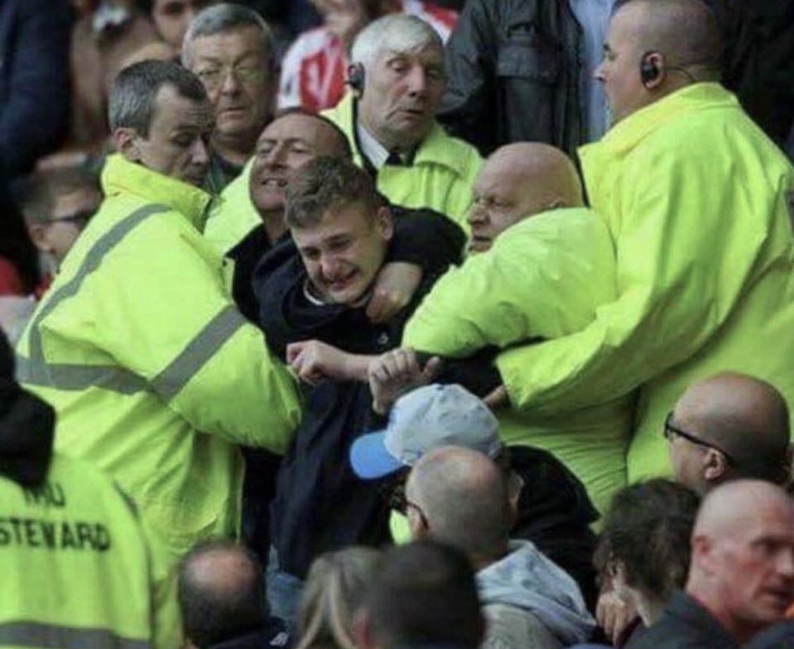 _Jeff_Powell's tweet photo. Disgusting scenes today at Old Trafford as stewards force United fans to stay and watch the game to the end 👀 #LIVMUN #LFCvMUFC @LFC https://t.co/GGn4ZJGzur