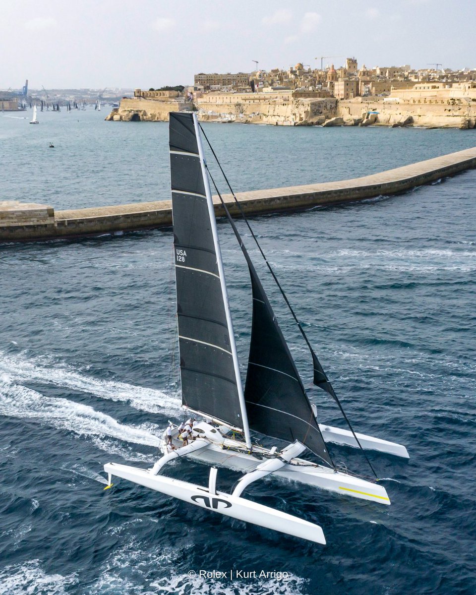 RolexMiddleSea's tweet photo. #BREAKINGNEWS! 🏆 A NEW RACE RECORD.

The MOD70 Argo (USA), skippered by Jason Carroll, crossed the finish line of the 2021 Rolex Middle Sea Race on Sunday 24th October at 20:39:28 to take Multihull Line Honours, finishing with an elapsed time of 33 hours 29 minutes 28 seconds. https://t.co/fvdJzd7RmC