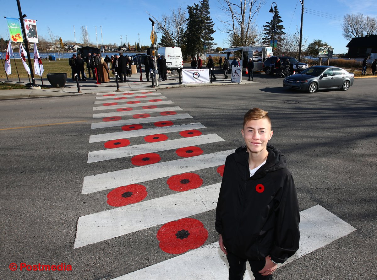 JimWellsphoto's tweet photo. The @CityChestermere officially opened a crosswalk decorated with poppies after local teen Keigan Davies thought veterans should be remembered and thanked year round @LeelaAheer #RemembranceDay https://t.co/HE6zekVPcx