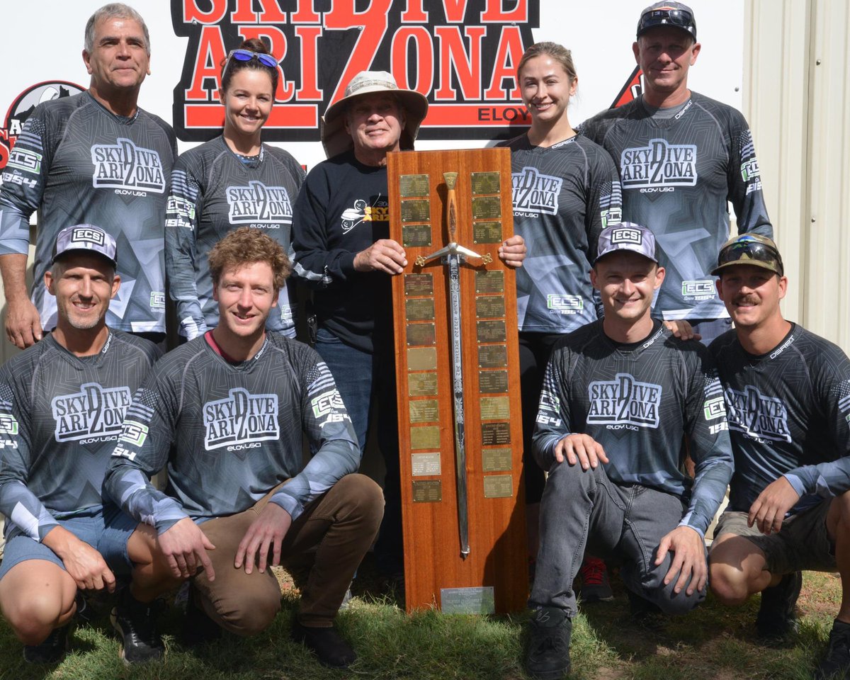 Larry Hill being entrusted with the Otley sword by the world champions Arizona XP 8. 
📸 by Mike Mcgowan 
#worldchamps #skydiveaz #ArizonaXP #Champions