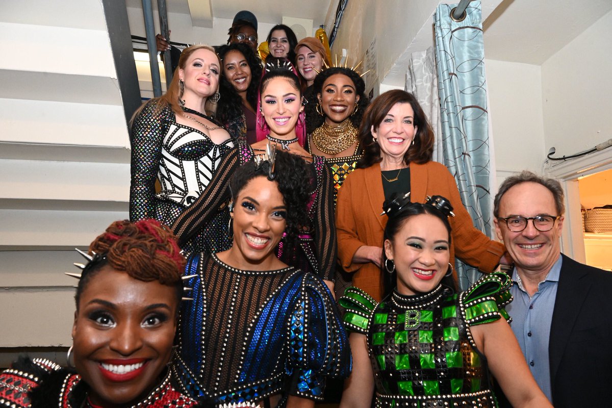 Governor Hochul stands with the cast of Six on Broadway