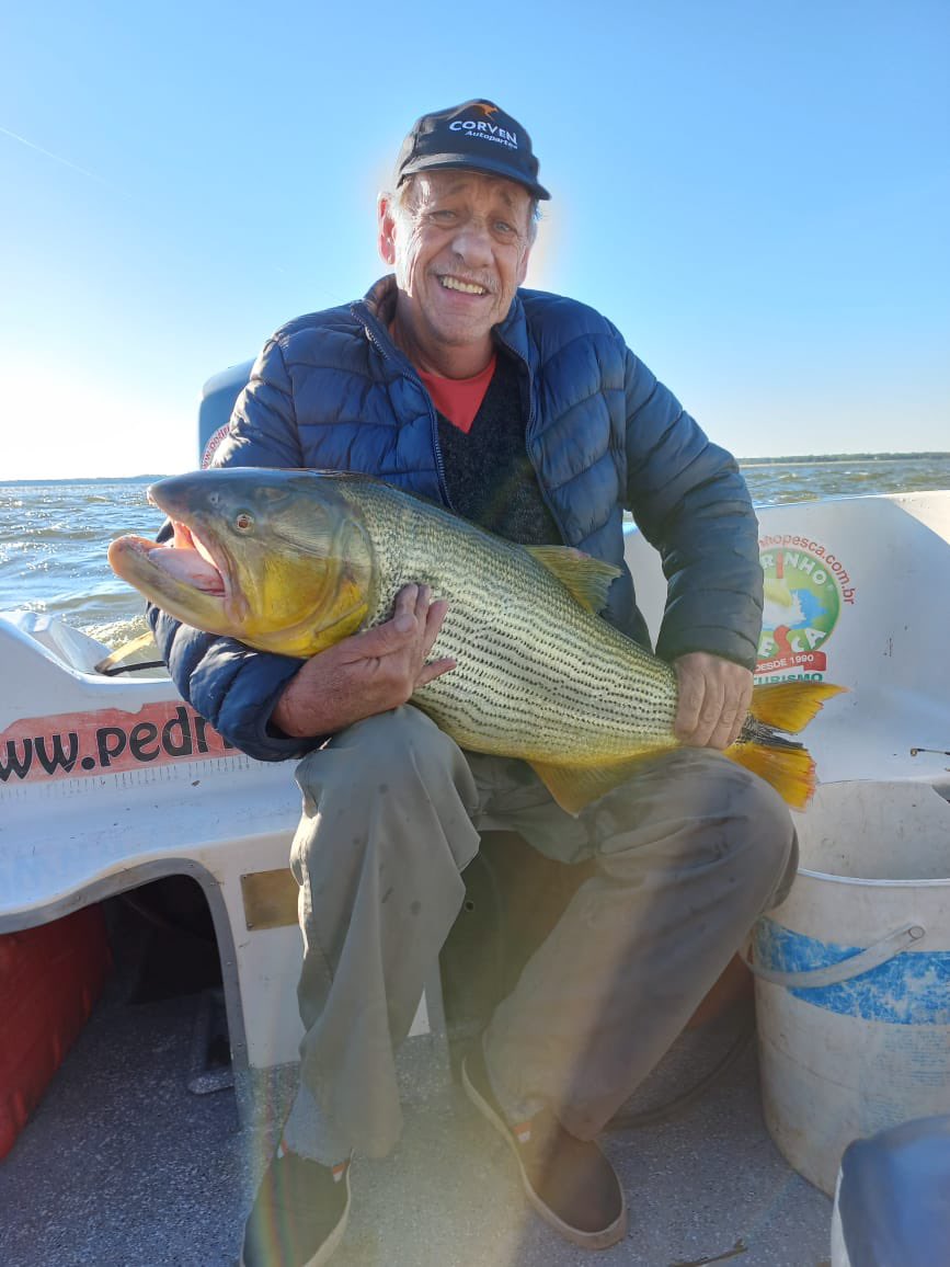 Foto de mi papá conmigo / foto de mi papá con un pescado que acaba de conocer