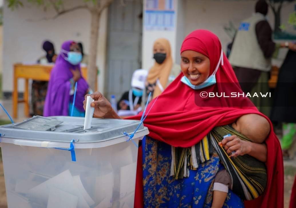 TIDES76's tweet photo. A mother holds her baby as she delightfully cast her vote with admiration and jubilation.
#PLGE 
#TPEC https://t.co/jxNh2myjKg