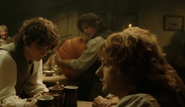 myelessar's tweet photo. this hobbit being really happy about his giant pumpkin is the biggest october mood 🍂🎃 https://t.co/uSs8U42Ss3
