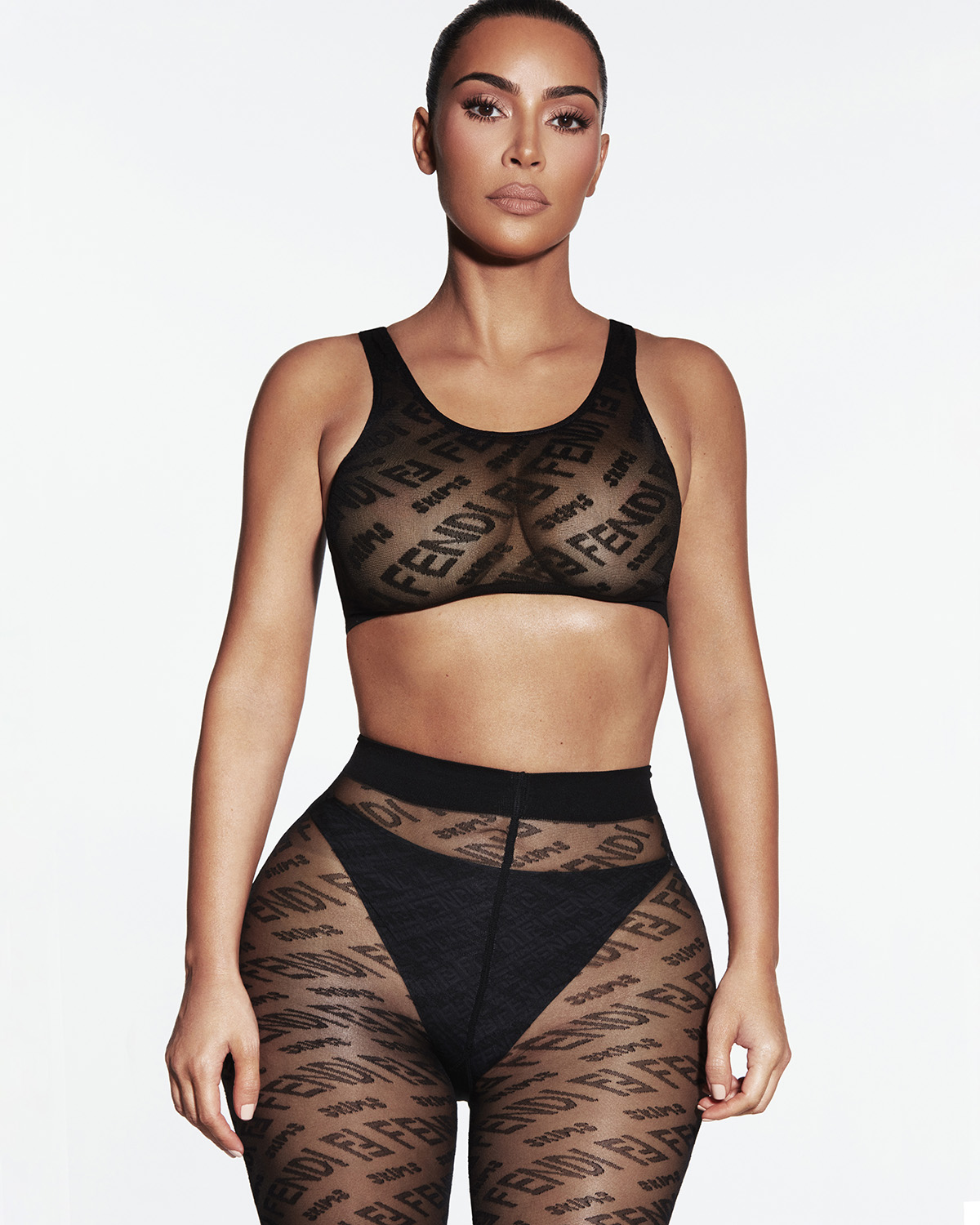 SKIMS on X: .@KimKardashian wears the FENDI x SKIMS Hosiery Bra