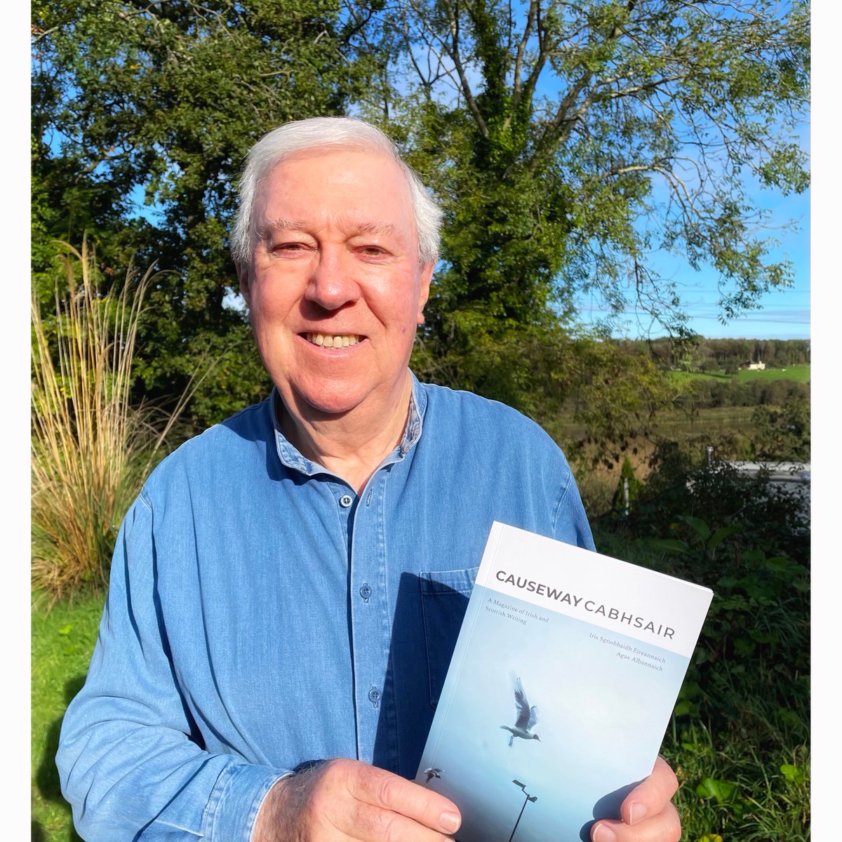 'Waking the Traveller' by Irish poet Anthony Wade opens the current edition of Causeway/Cabhsair. It was inspired by a freight train horn heard early one morning in Denver, Colorado. Here's Anthony with the magazine in Rostellan Lake, East Cork. #irishpoetry #irishpoet