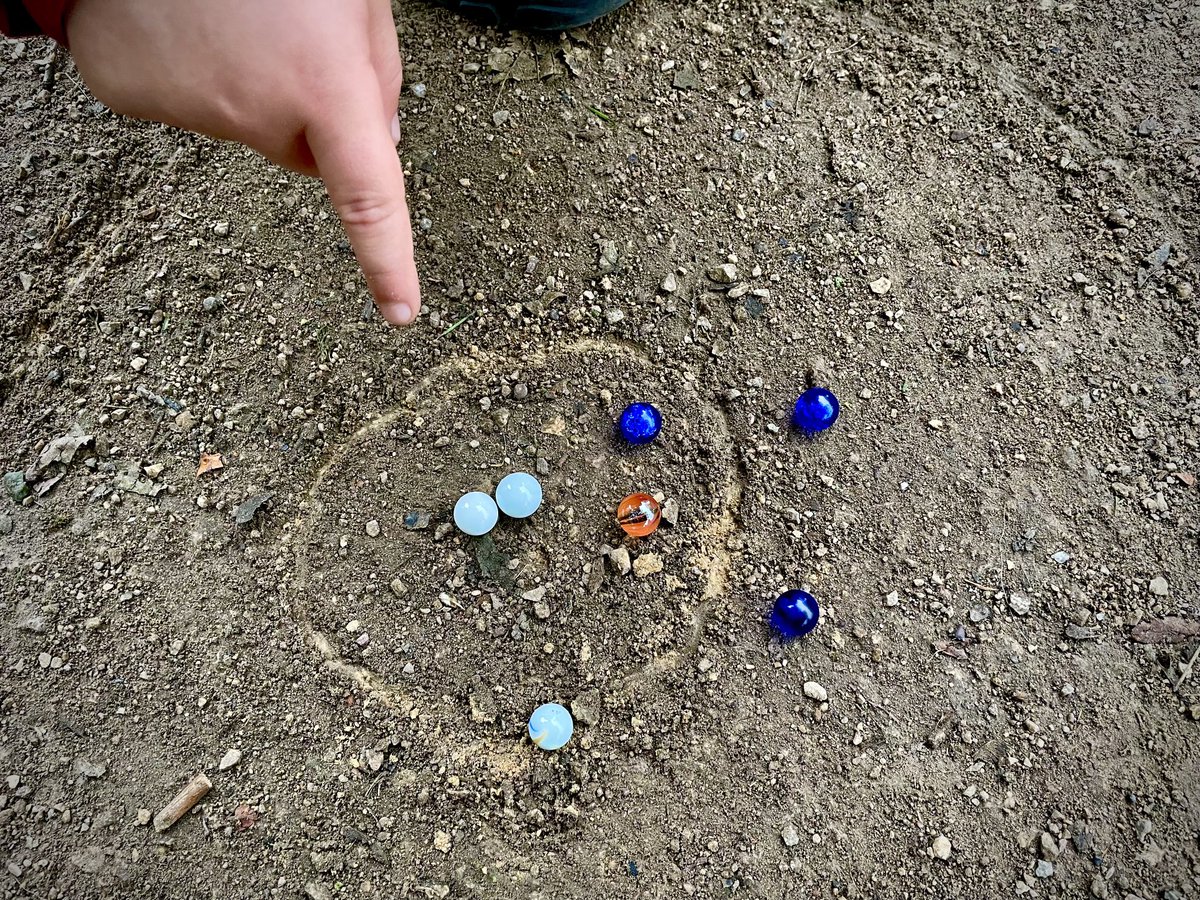 paul_bailey_'s tweet photo. 1st day of half-term, experimenting with old school play activities to keep kids (+me) entertained. Today - Marbles in the park!#designthinkingdad https://t.co/zzkXGwPfqR