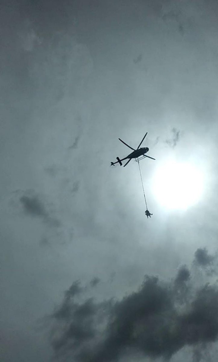 KenyaPower's tweet photo. Watching Patrick Mwau hanging like a movie stuntman as he's being hoisted by a helicopter up an electricity tower or pylon would leave anyone at the edge of their seat. But for him, this has been his daily job for 6 years now. Read more..https://t.co/fV3QUyvTV2
#KenyaPowerAtWork https://t.co/UV1ANd3UmL