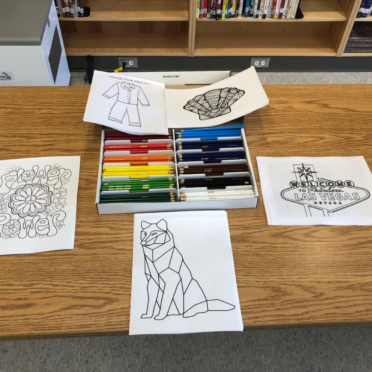 glsslibrary's tweet photo. The library colouring table is all set for Spirit Week! https://t.co/mgzNkyPXAA